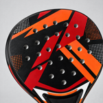Close-up of the red racket face and hole pattern